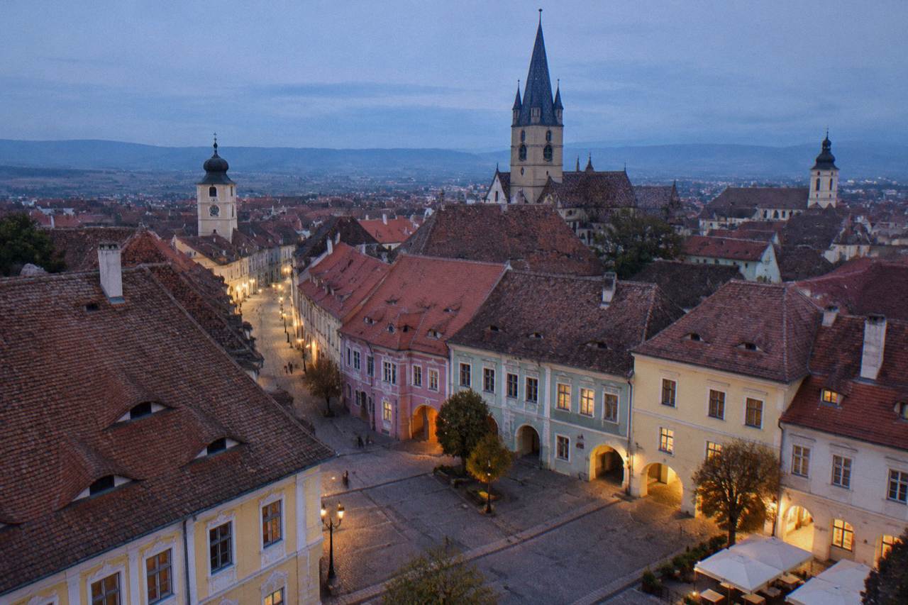 Colourful baroque houses and church spires of Sibiu old town seen from above