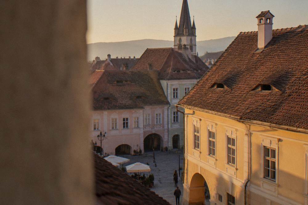 Close view of Sibiu roof windows with dark openings that resemble watching eyes