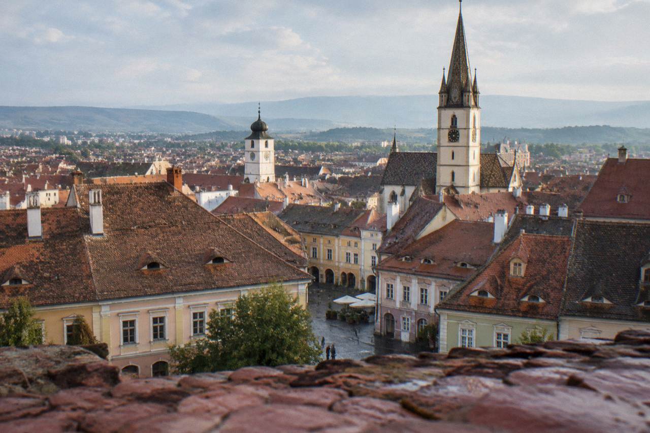 Sibiu old town rooftops and church towers seen from a height