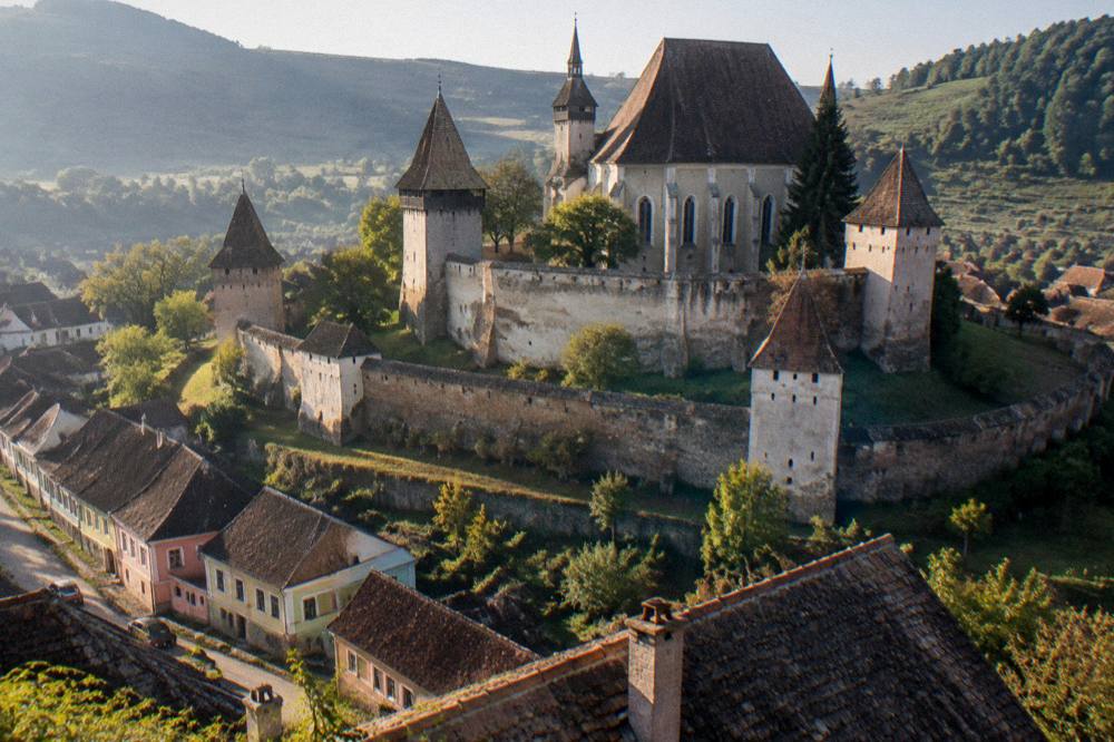 Fortified church with defensive walls in a Saxon village in rural Transylvania