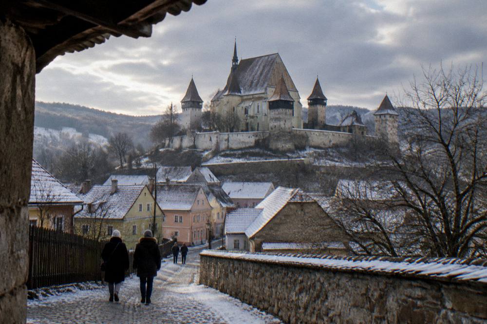 Fortified church with towers and walls in a Transylvanian village