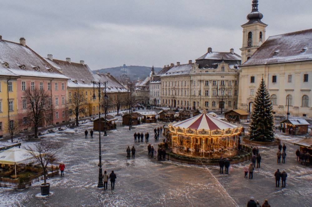 Illuminated Christmas carousel in a Romanian square