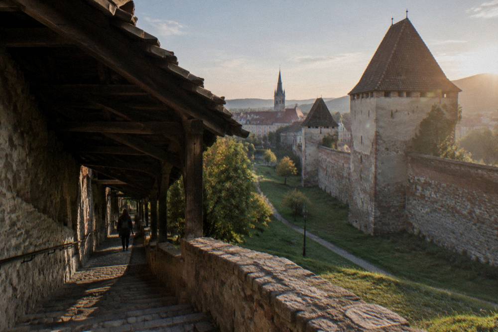 Covered staircase of the Stairs Passage descending beside old city walls in Sibiu